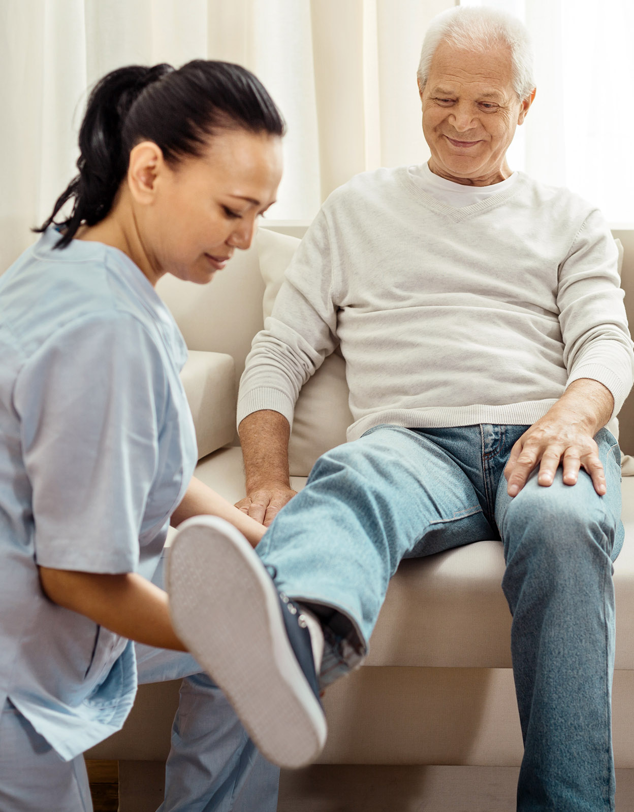Occupational therapist helps a patient at home